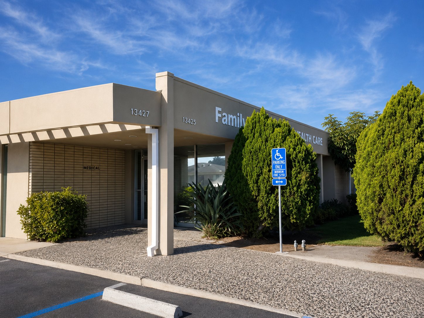 Building entryway with handicap parking and medical office signage