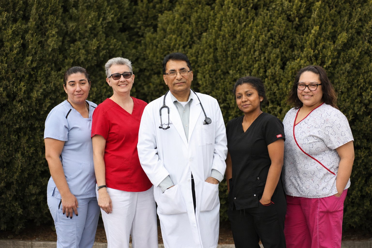 Dr. Khalid B. Khan with the Family and Immediate Healthcare team